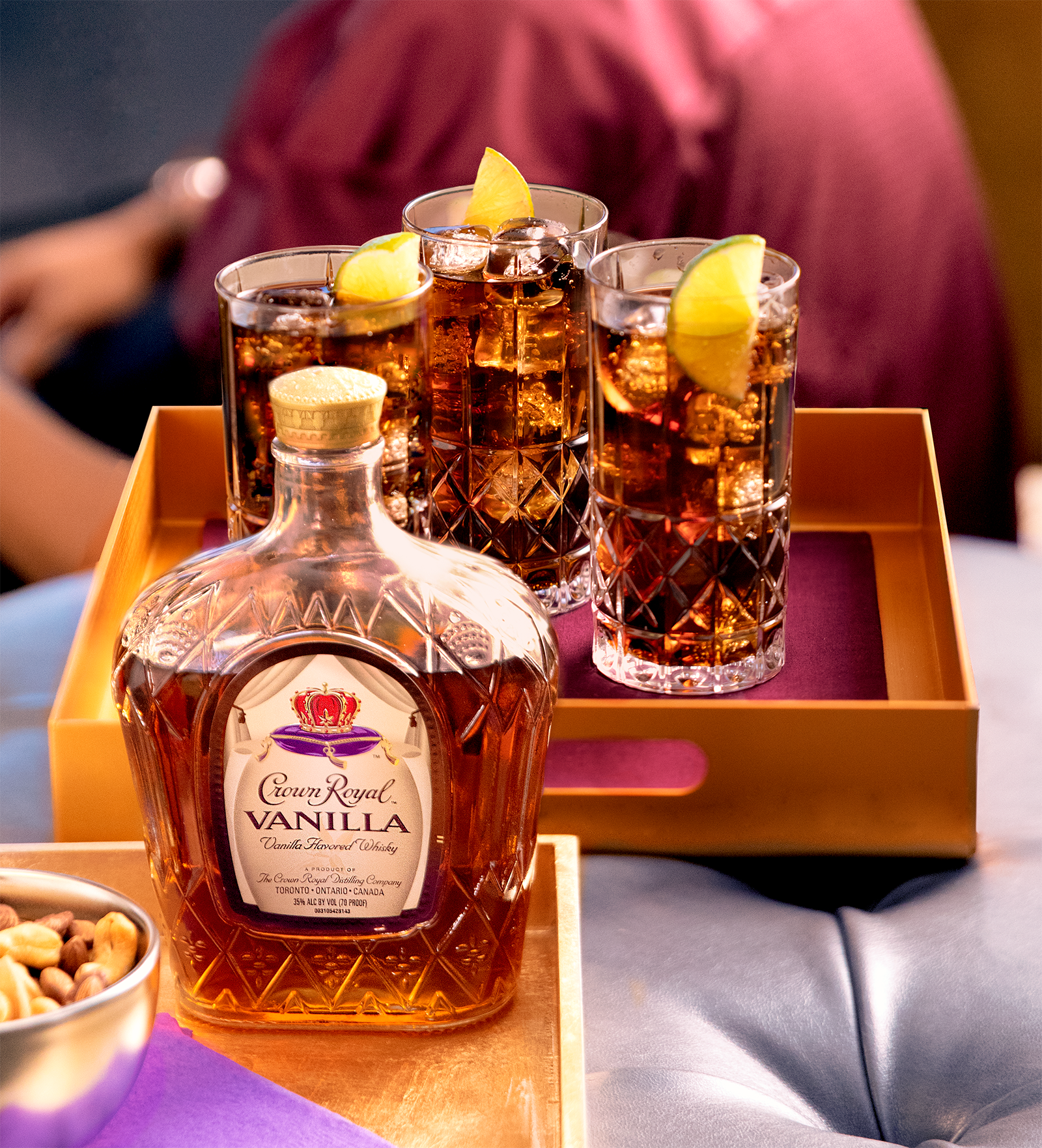 Kickoff Crown Cola Whisky Cocktail with a bottle of Crown Royal Vanilla