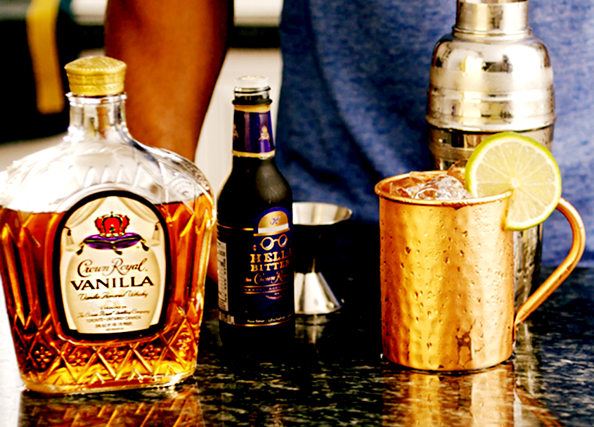 Tailback Vanilla Mule Whisky Cocktail with a bottle of Crown Royal Vanilla