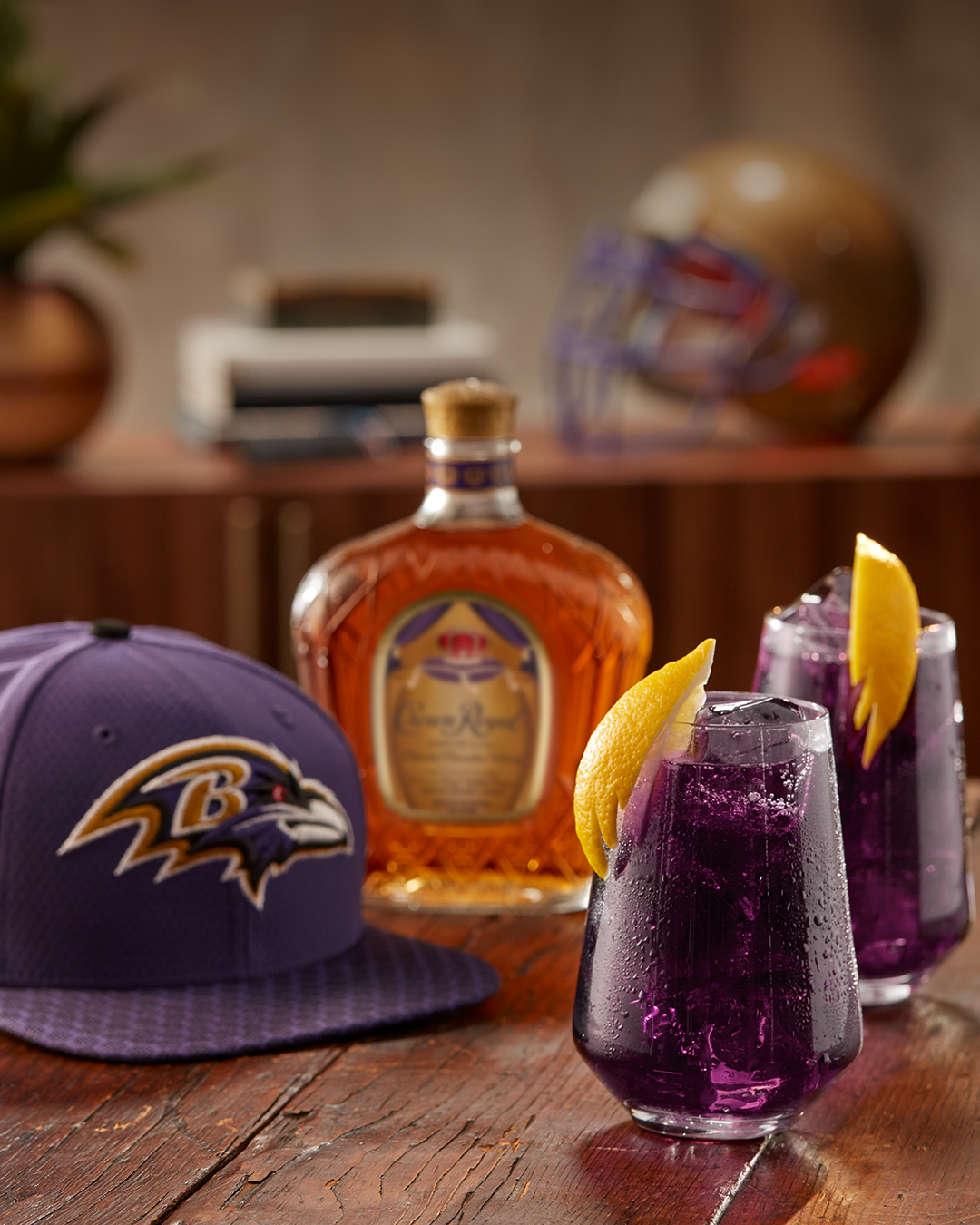 Baltimore Ravens (Crown + Grape Soda) with a bottle of Crown Royal Deluxe and a Ravens hat